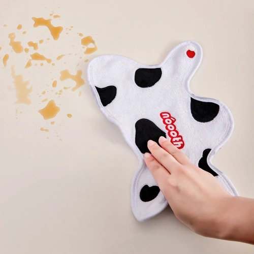 The Milk Spilled Onto The Hand Towel